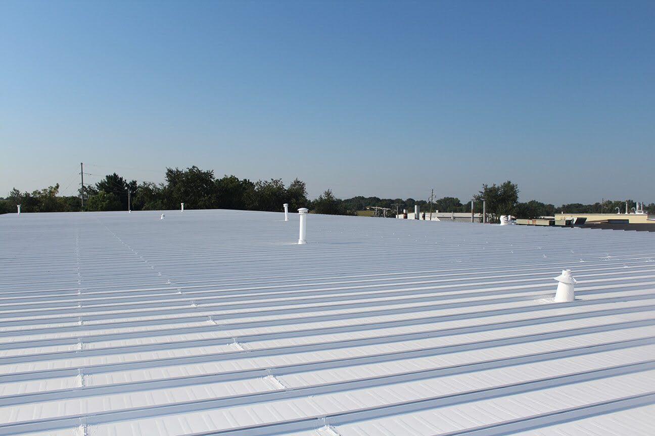 A commercial metal roofing system on a sunny day