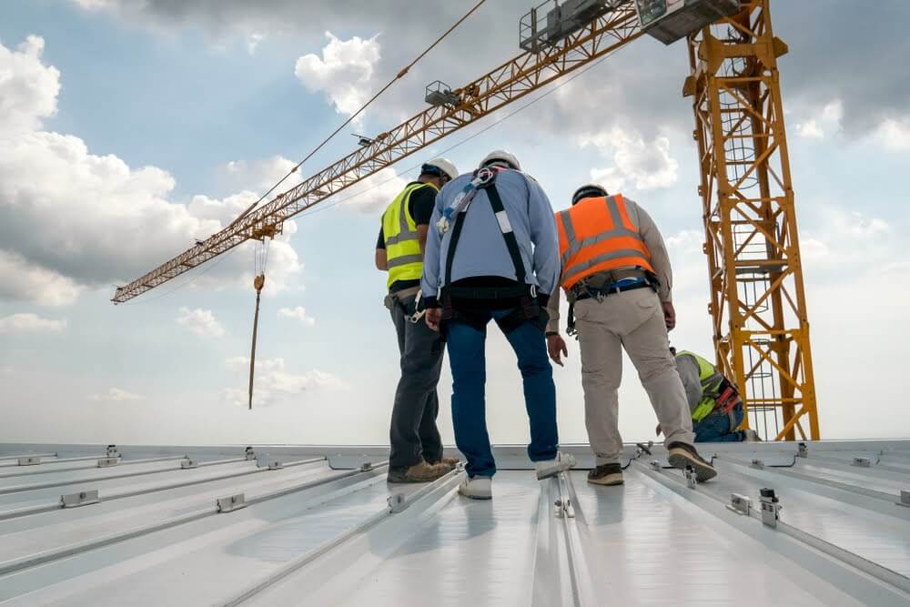 A commercial roof inspection on commercial building by crew
