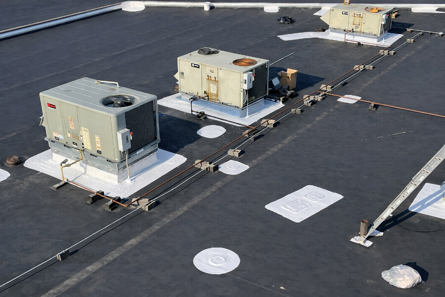 chicago-commercial-flat-roof-repair-hvac-units-99 Commercial flat roof repair in Chicago around rooftop HVAC units and roof penetrations