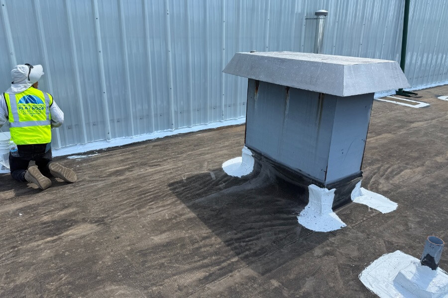 chicago-commercial-roof-repair-flashing-detail-99 Commercial roof repair in Chicago showing flashing and penetration sealing on a flat roof