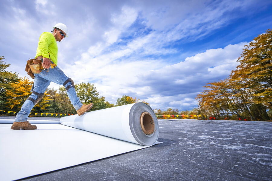 commercial-flat-roof-installation-logistics-warehouse-tpo-99 Commercial roofing installation on logistics warehouse flat roof with TPO membrane system