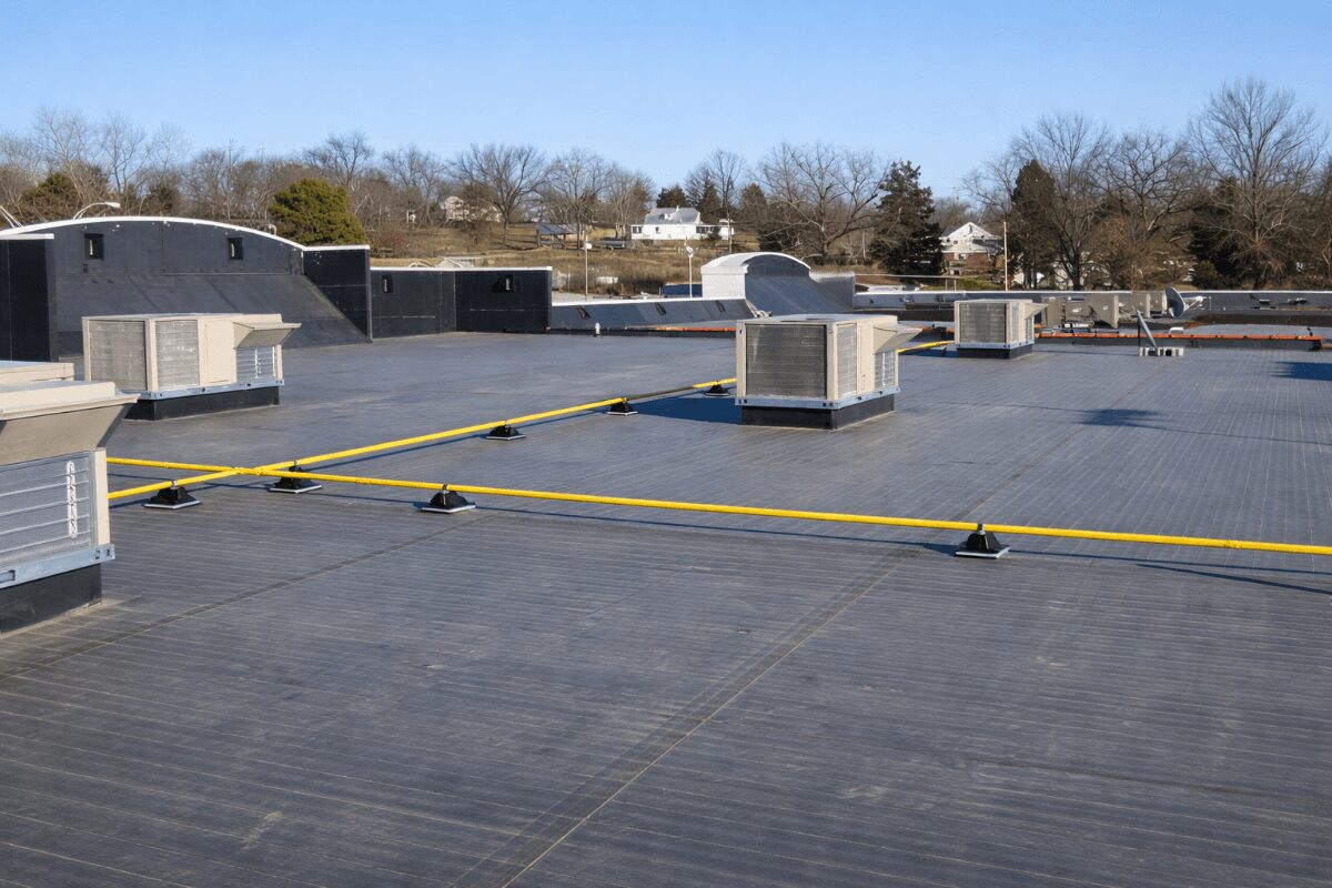 large-commercial-epdm-roof-system-98 Large commercial building with EPDM rubber roofing system and rooftop equipment