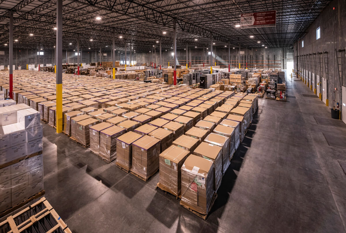 warehouse-distribution-center-interior-inventory-storage-99 Interior of logistics warehouse with palletized inventory storage in large distribution facility