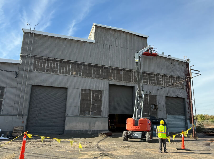 manufacturing-facility-exterior-commercial-roof-project-99 Commercial roofing project at manufacturing facility with industrial building exterior