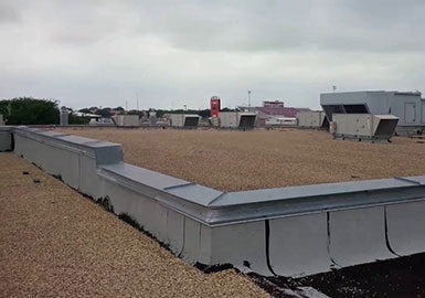 Built-up roofing system installed on a flat commercial roof