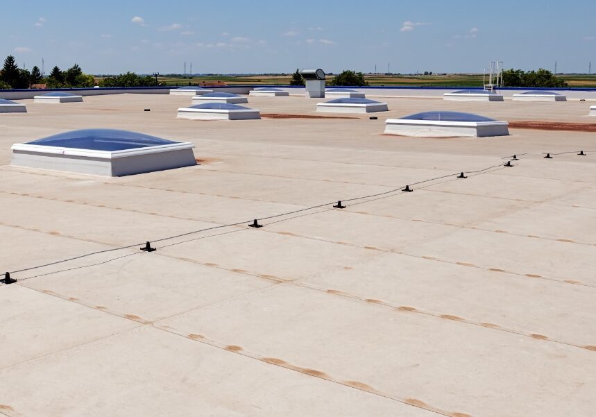 commercial-roof-overlay-installation-99 Commercial roof overlay installed over an existing roofing system